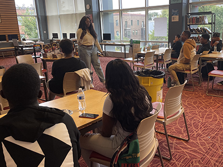 Image of Hannah Sawyer with Dunbar High School students